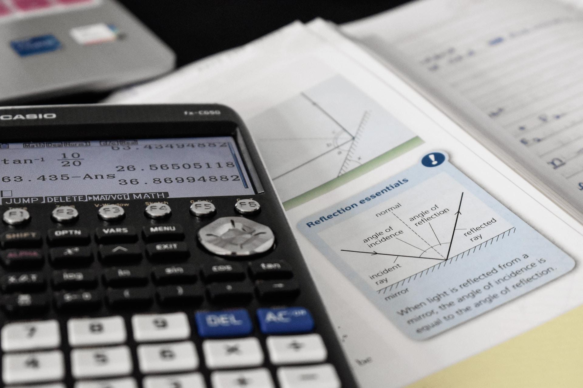 A calculator and a maths textbook.